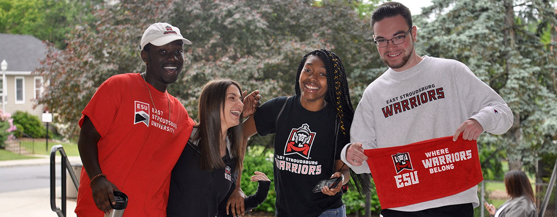 Students laughing and wearing ESU shirts 
