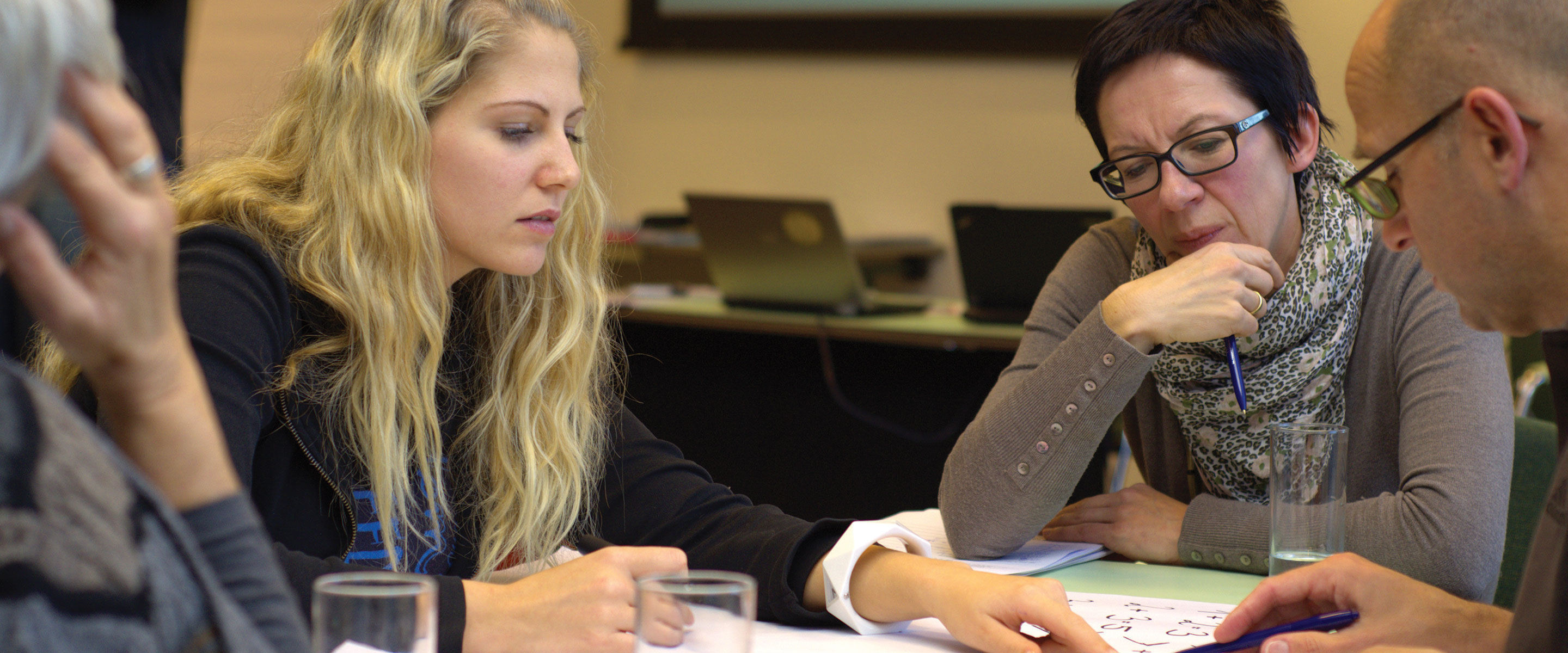 2 women going over reports