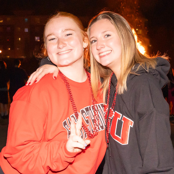 Students standing in front of barnfire