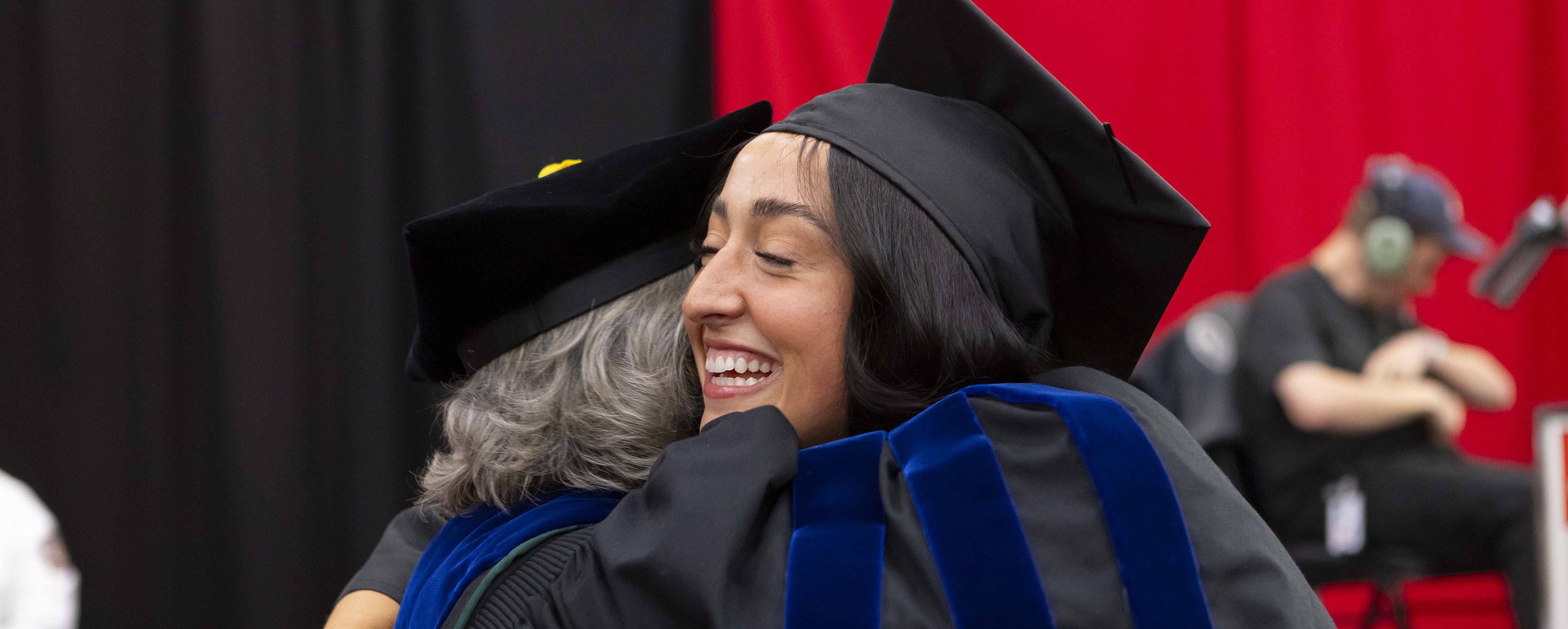 student listening to webinar on laptop