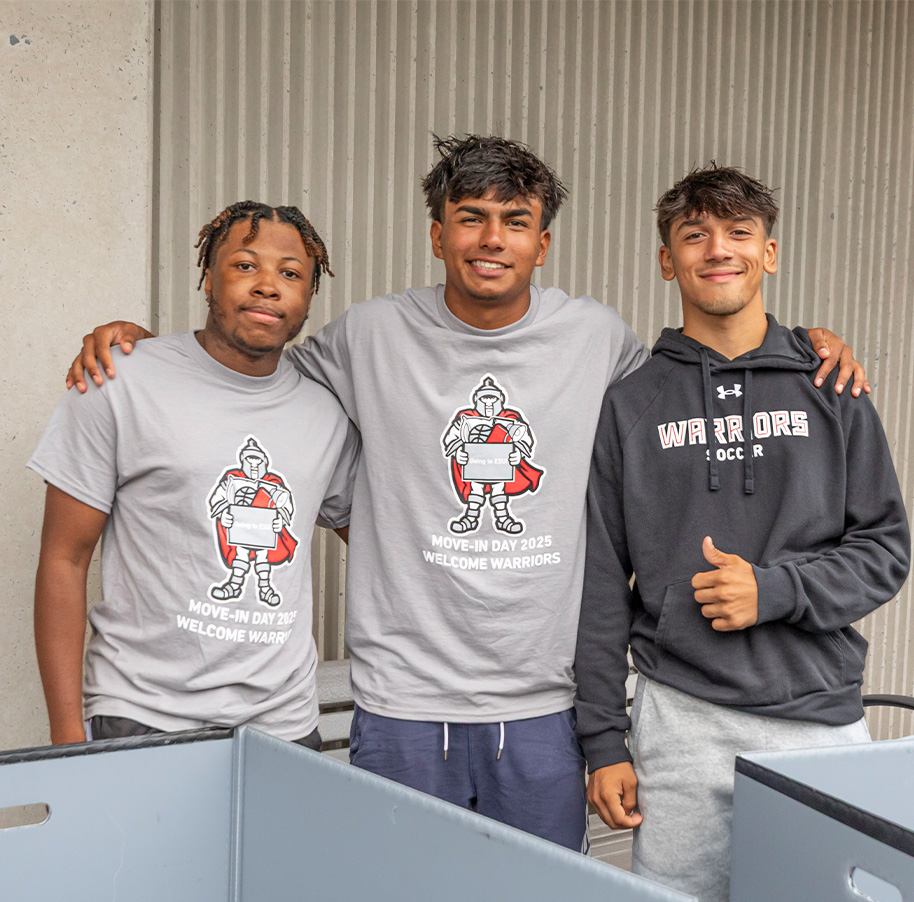 Three guys assisting on Move-In Day
