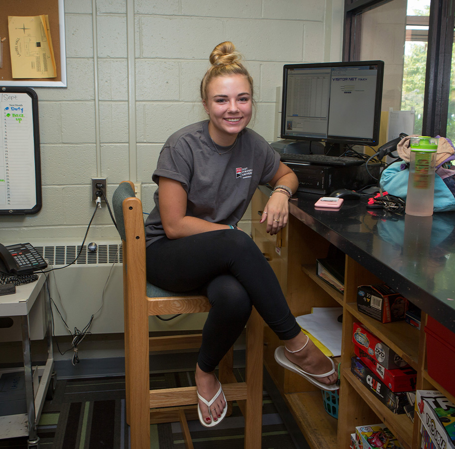 Student worker working at front desk